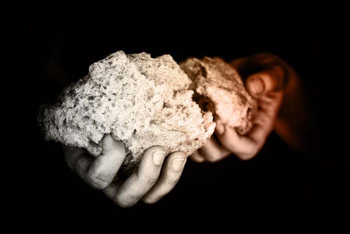 evangelism beggar showing bread